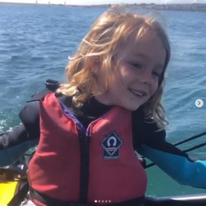 Little girl sailing Tiwal 3 inflatable sailing dinghy